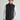 Stylish man wearing the Frontier 23 - Heated Gilet Vest, perfect for staying warm in cold weather.