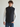 Stylish man wearing the Frontier 23 - Heated Gilet Vest, perfect for staying warm in cold weather.