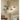 Lumivora Luxe Pendant Light – Elegant Travertine Stone and Wood Design in warm living room