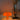 Modern Mushroom Table Lamp Bright Orange LED USB glowing orange mushroom lamp on desk with vase decor.