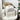 Cream quilted Cat Carrier Backpack - Stylish Pet Travel Bag on a cozy chair with golden longhair cat